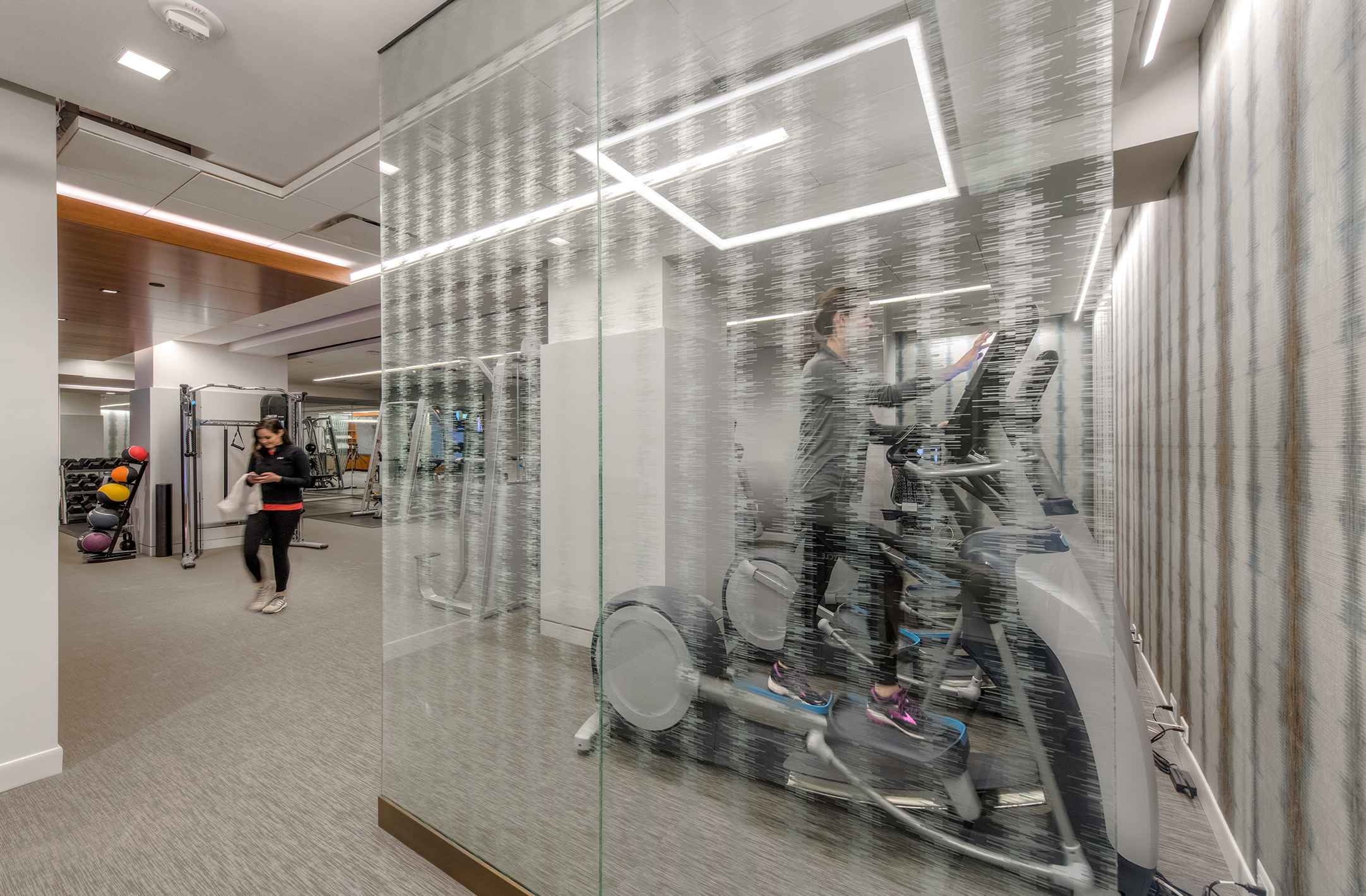 Image of step machines and cardio equipment at the 1500 K Street on-site fitness center